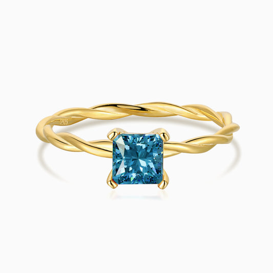 Blue Stone Ring with a Twisted Band in Gold